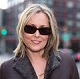 Tortoise shell sunglasses by Chanel, gold necklace by Selen Design New York, and coat from the now closed Original Leather Store in New York City