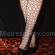 Large fishnet-patterned tights and pumps